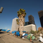 A,Homeless,Encampment,Next,To,A,Downtown,Los,Angeles,Freeway.