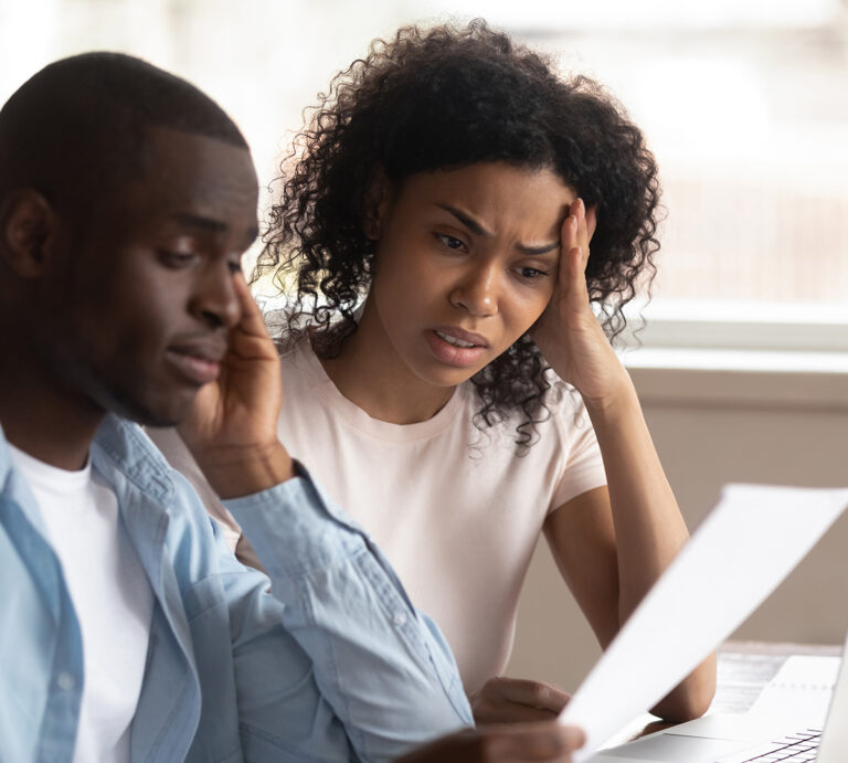 Troubled,Pensive,Biracial,Young,Couple,Feel,Disappointed,Consider,Paperwork,Paying