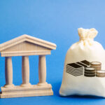 Money,Bag,And,Government,Building.,Business,And,Finance,Concept.,Deposit,
