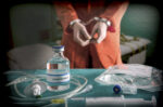 Prisoner,Handcuffed,To,Death,By,Lethal,Injection,,Vial,With,Sodium