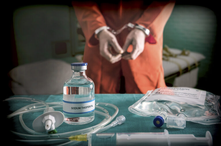 Prisoner,Handcuffed,To,Death,By,Lethal,Injection,,Vial,With,Sodium